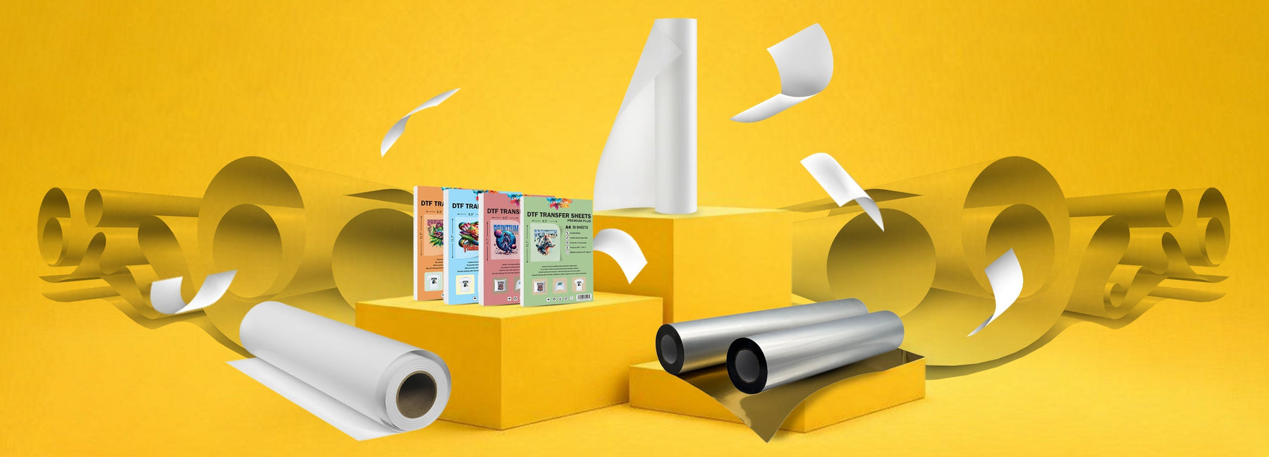 DTF transfer film rolls and sheets with colorful packaging on yellow background, printing supplies