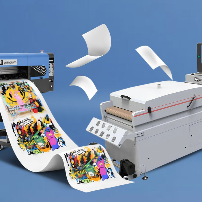DTF printer with vibrant transfer film and heat press equipment on blue background